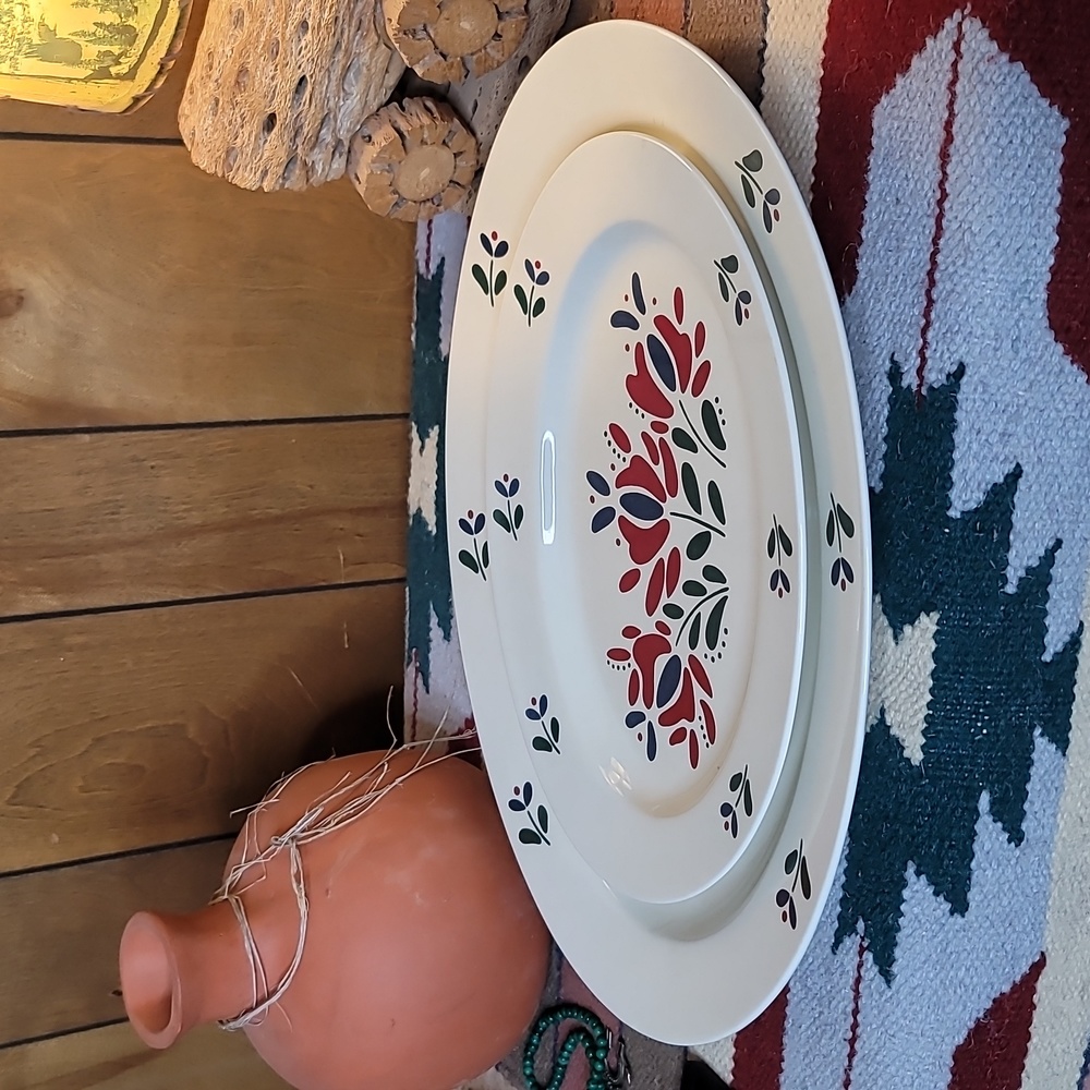 Asta nesting plates with floral pattern (1982)